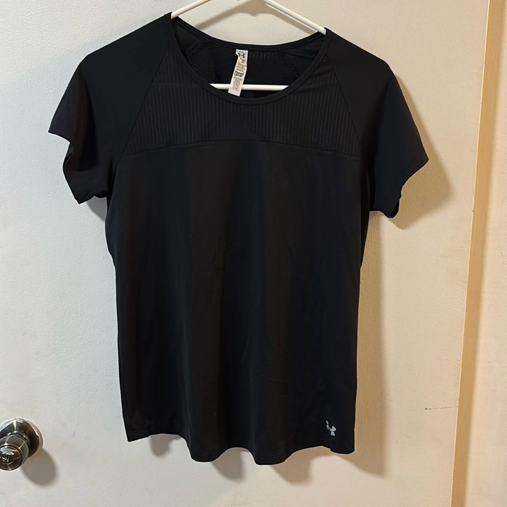 Under armour heat gear short sleeve with back cut out.